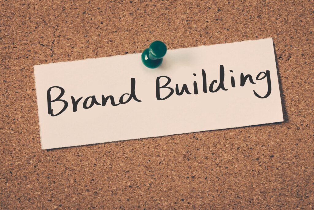 branding or brand building concept in piece of paper pinned